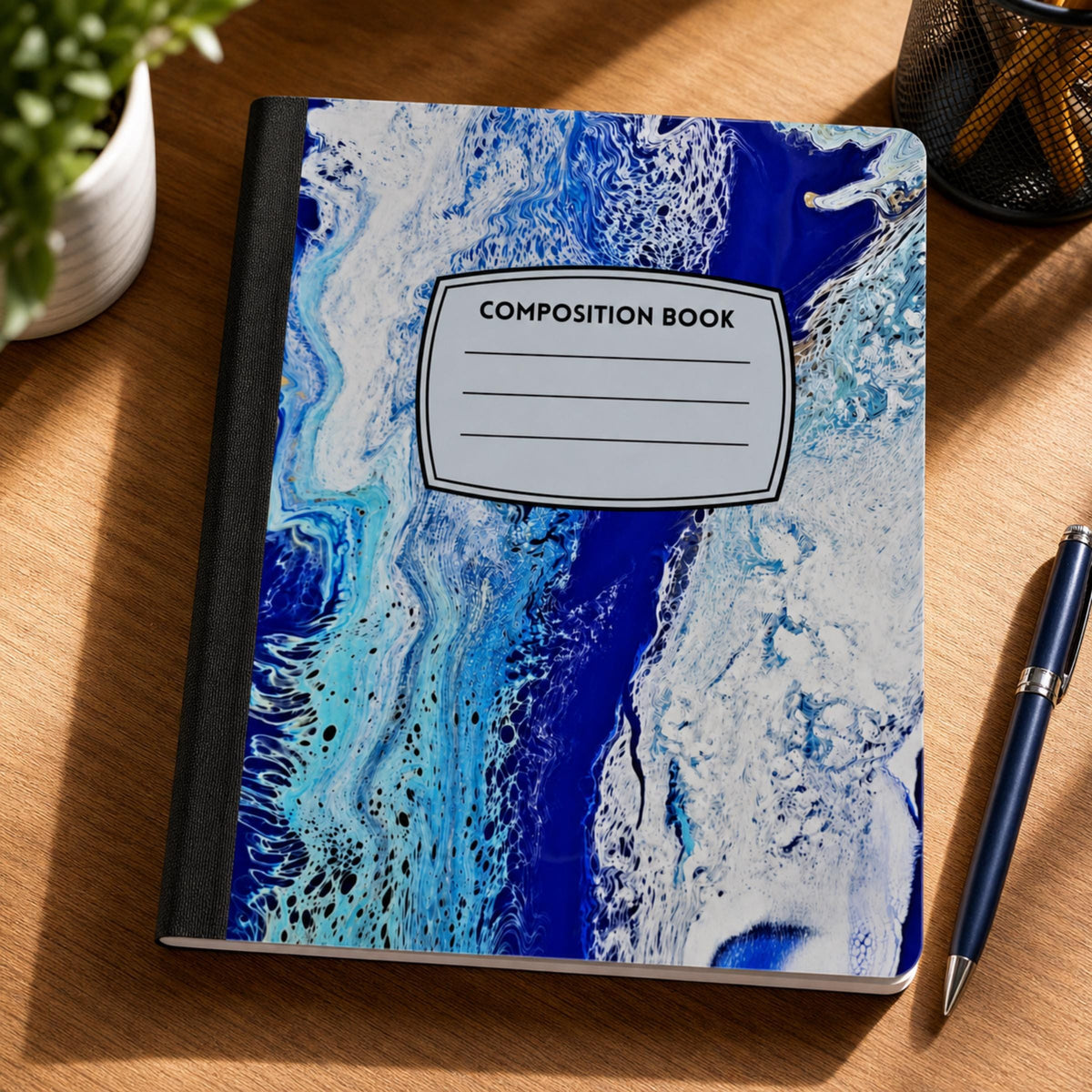 Glacier Tide acrylic pour art composition notebook on a desk