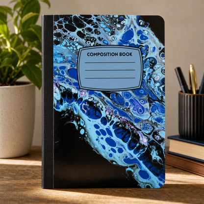 Midnight Ripple acrylic pour art composition notebook on a desk