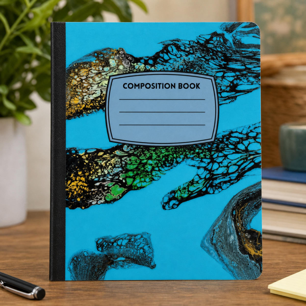 Reef Lace acrylic pour art composition notebook on a desk